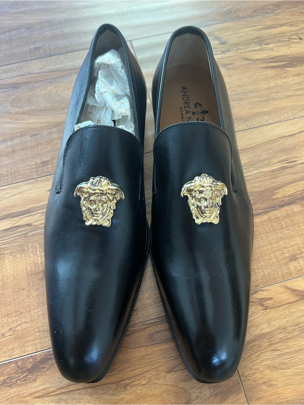 Black Leather Slip-On Loafers with Gold Medusa Medallion